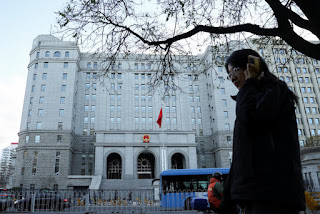 China court jails journalist for seven years on spy charges, family says