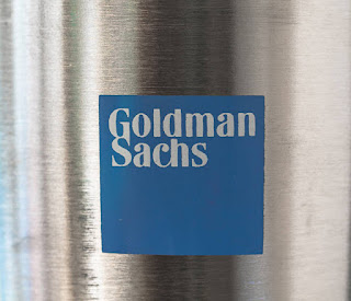 Goldman Sachs has recently revised its oil price forecasts, projecting a decline in future oil prices due to rising recession risks and global supply dynamics. Here’s a detailed breakdown of the situation:  📉 Revised Oil Price Projections for 2025 and 2026 Goldman Sachs has lowered its price forecast for both Brent crude and WTI for the next few years. By December 2025, they now expect:  Brent crude to trade at $62 per barrel  WTI to drop to $58 per barrel  For December 2026, the bank anticipates further declines, with Brent potentially hitting $55 and WTI at $51 per barrel.  These revisions reflect mounting concerns over a potential global recession and the growing uncertainty surrounding OPEC+ supply dynamics.  🌍 Economic and Geopolitical Factors Driving the Change Goldman Sachs’ revised forecast comes amid:  U.S. recession risk: The likelihood of a recession in the U.S. within the next 12 months has increased to 45% from a previous estimate of 35%.  Trade tensions and tariffs: Ongoing trade disputes, particularly between the U.S. and China, are further clouding the economic outlook, adding stress to global demand for oil.  OPEC+ and global supply: Any changes to production cuts by OPEC+ could exacerbate downward pressure on oil prices, especially if oil-producing countries increase supply while global demand remains soft.  🔮 Possible Downside Scenarios In a more severe economic downturn scenario, which could involve a global recession and a reversal of OPEC+ production cuts, oil prices could fall to below $40 per barrel by the end of 2026. This would mark a significant shift in the energy market.  💡 Implications for Investors and the Energy Sector Oil producers: Lower prices could put pressure on producers, especially those with high production costs. Companies may face squeezed profit margins and reduce capital expenditures or delay new investments in exploration and development.  Investor strategy: The energy sector may need to reevaluate investment strategies, with a focus on companies that are better positioned to weather price fluctuations, possibly turning toward those with more stable cash flows or lower break-even costs.   This revised forecast illustrates the growing uncertainty in the global economy and energy markets, and its ramifications for both the financial sector and energy-producing nations.